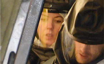 Two Jacobs employees in PPE at the Harwell Irradiation Facility.